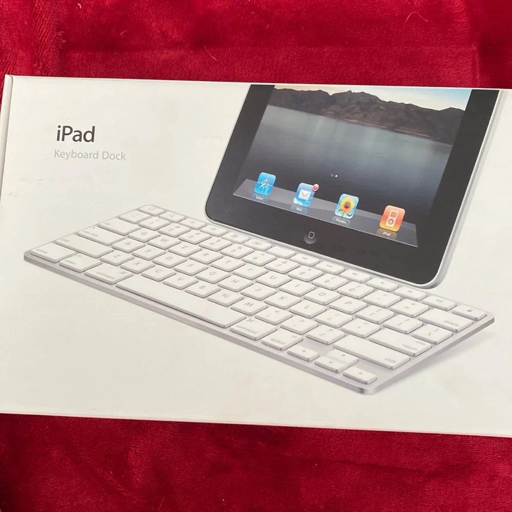 A New in Box original iPad keyboard. It has the original connector, though